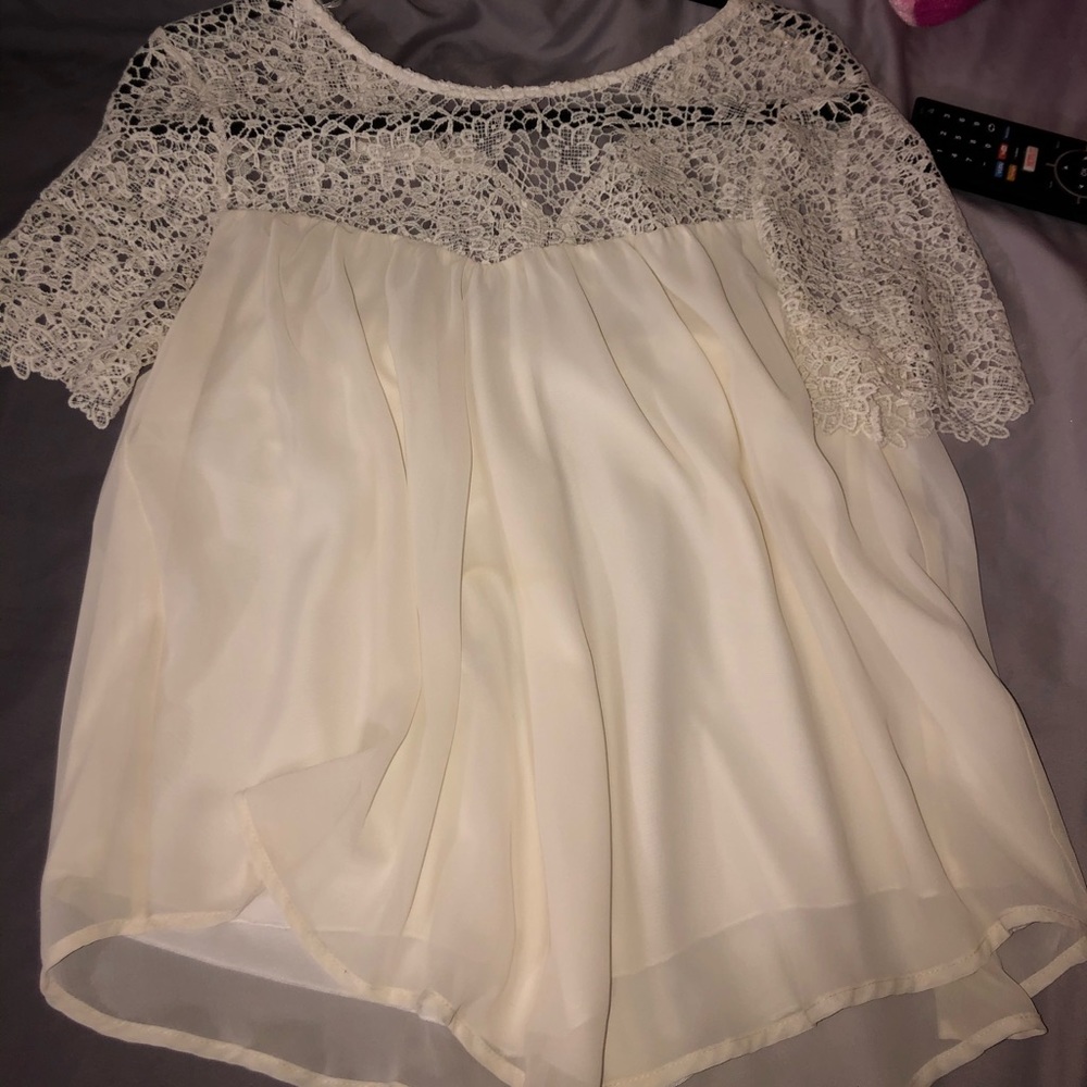 White flowy top.